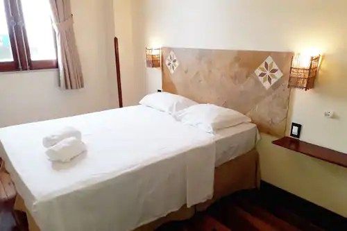 Imagem de um quarto da pousada Iracema Villa em fortaleza ce