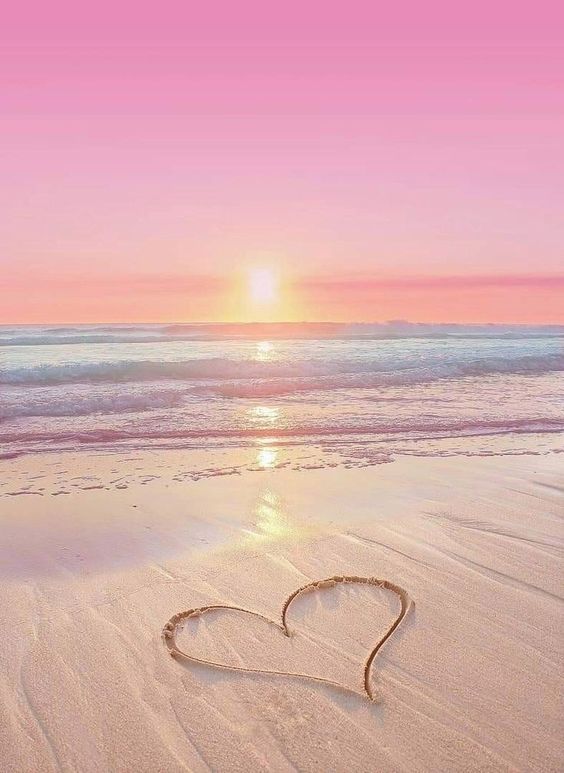 Wallpaper coração na areia da praia